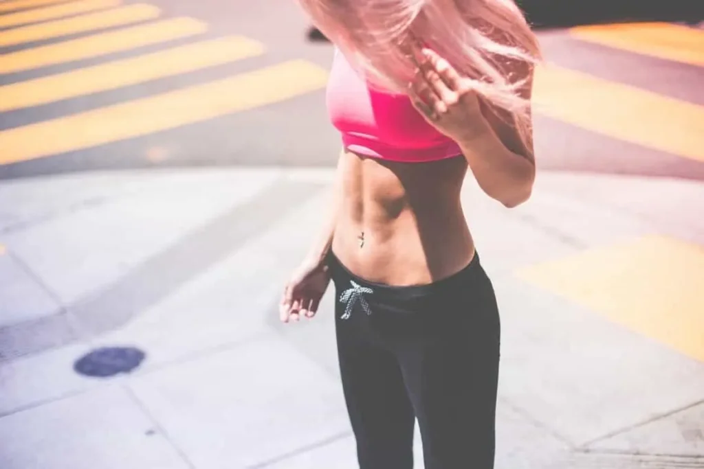 Woman with toned stomach after LA-EMS Body Sculpting Treatment Wood Green